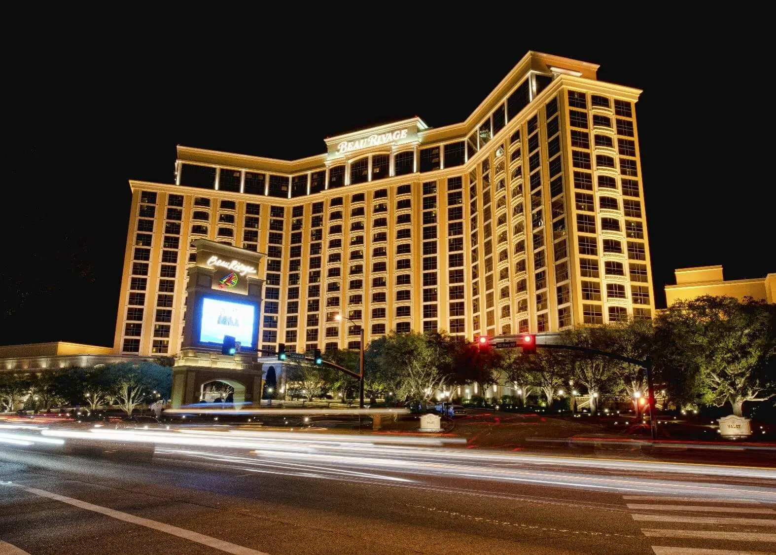 Image of the fronting of the Beau Rivage casino and hotel in Mississippi at nighttime